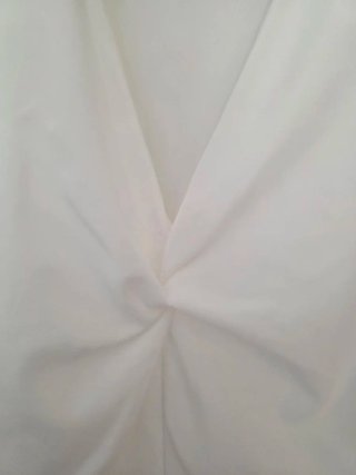 Conjunto blusa blanca y falda pantalón lunares
