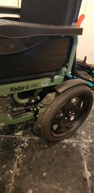 Silla de ruedas con motor eléctrico