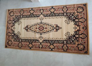 Tris di tappeti decorativi