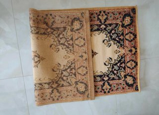 Tris di tappeti decorativi