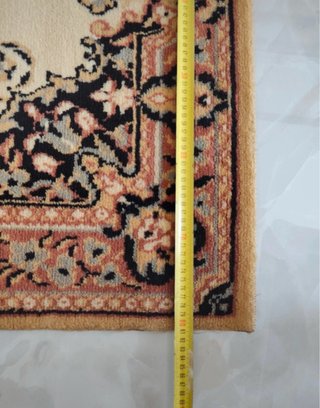 Tris di tappeti decorativi