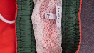 Bañador niño Lacoste naranja Talla 8 años.