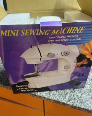 Mini Máquina de Coser Eléctrica