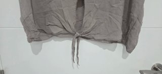 Blusa marrón clarito con nudo