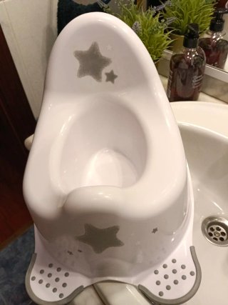 Orinal infantil blanco con estrellas