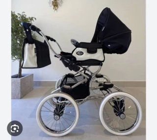 Carrito de bebé con silla y accesorios