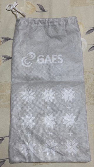 Bolsa de tela GAES con cordón.