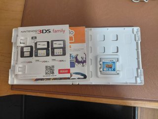 Nintendo 2DS rosa con 3 juegos y Tomodachi life