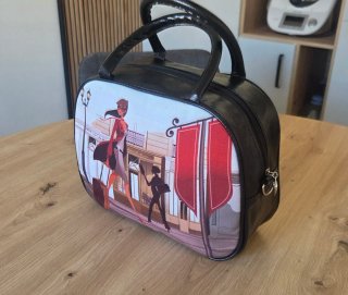 Bolso mano tipo maleta estampado