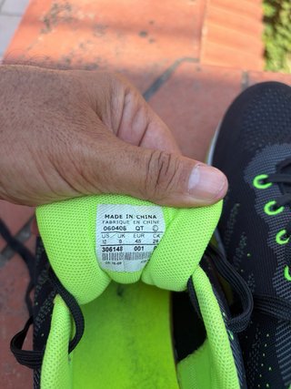 Scarpe da running nere e verdi come nuove