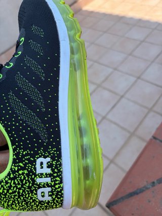 Scarpe da running nere e verdi come nuove