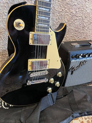 Guitarra SX Negra + Bolsa + Amplificador Fender