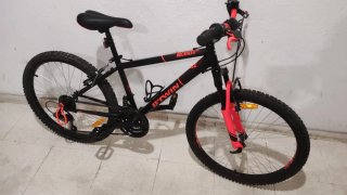 Bicicleta Rockrider BTWIN 24 Negra/Naranja