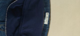 Vaqueros premamá talla 36 rotos