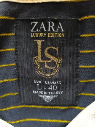 Polo Zara rayas azul marino  y dorado