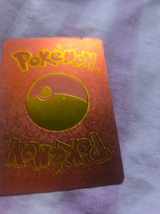 Carta Pokémon Mewtwo y Mew GX Dorada