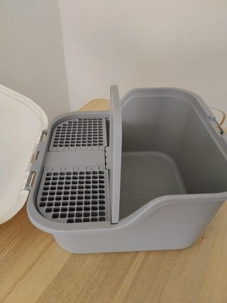 Arenero para gato con techo
