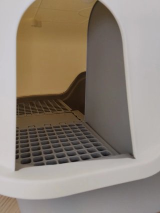 Arenero para gato con techo