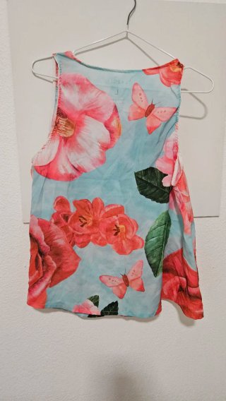 Camisa sin mangas floral mariposa