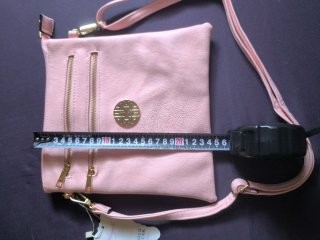 Bolso de mano Angela rosa con detalles dorados