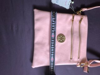 Bolso de mano Angela rosa con detalles dorados