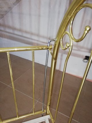 Cuna bebé vintage dorada