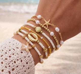Conjunto 6 pulseras conchas y estrellas