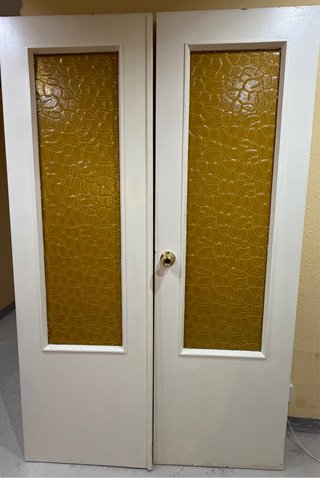 Puerta doble con cristal