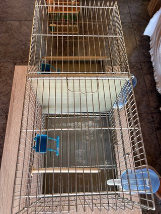 Jaula doble para pájaros con separador