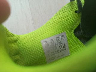Botas de fútbol Puma niño grises y verdes