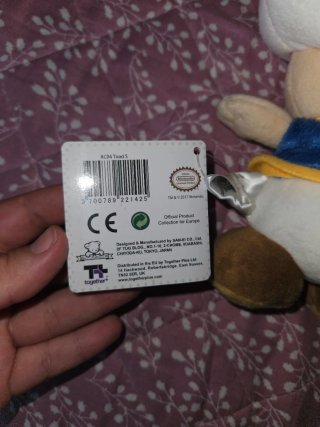 Peluche Toad Super Mario con etiqueta