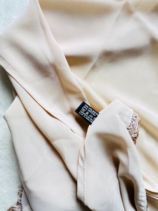 Mantón beige con flecos