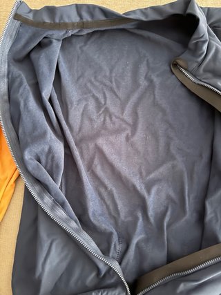 Chaqueta ciclismo azul y naranja