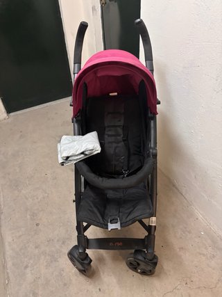Silla de paseo tipo paraguas rosa y negro
