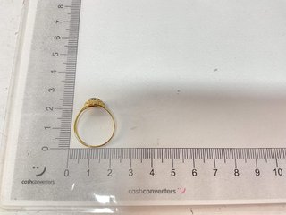 anillo oro 18k con piedra con circonita,zafiro