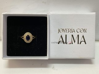 anillo oro 18k con piedra con circonita,zafiro
