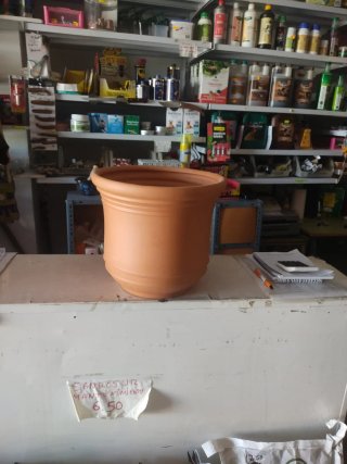 Maceta de terracota estilo campana