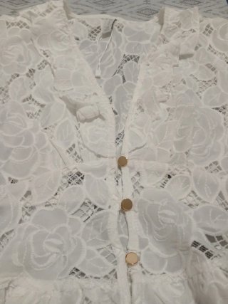 Blusa encaje floral sin mangas