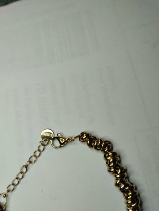 N550 Bracciale anellini incrociati inox oro uomo