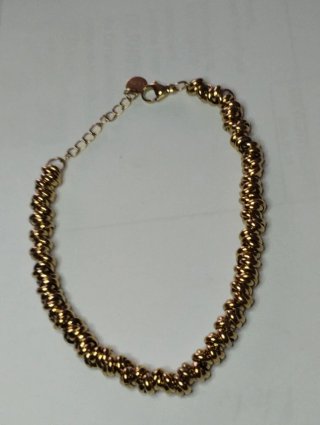 N550 Bracciale anellini incrociati inox oro uomo