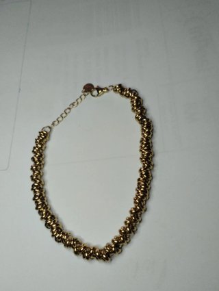 N550 Bracciale anellini incrociati inox oro uomo