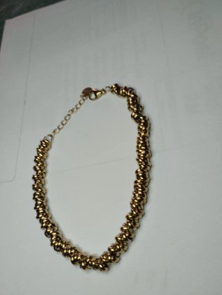 N550 Bracciale anellini incrociati inox oro uomo