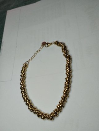 N550 Bracciale anellini incrociati inox oro uomo