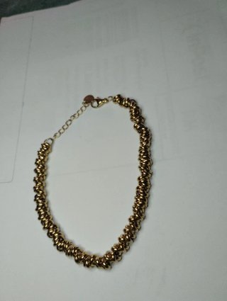 N550 Bracciale anellini incrociati inox oro uomo