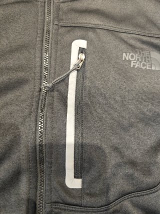 Chaqueta The North Face gris con capucha