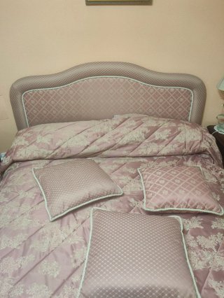 Edredón y cojines habitación