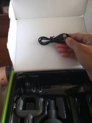 Pistola de masajes nueva
