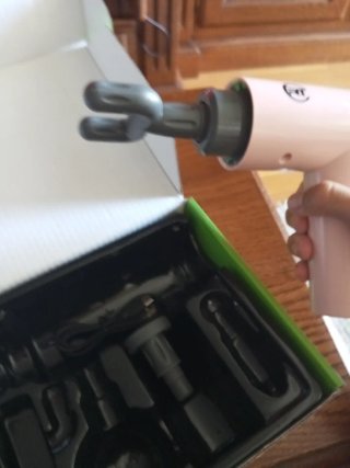 Pistola de masajes nueva