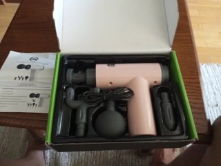 Pistola de masajes nueva