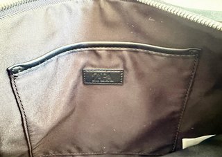 Bolso pelo vaca blanco y negro